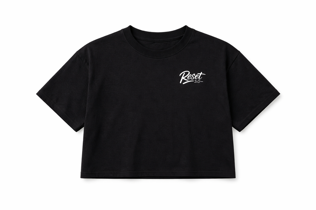 Black crop top with a white logo on a white background