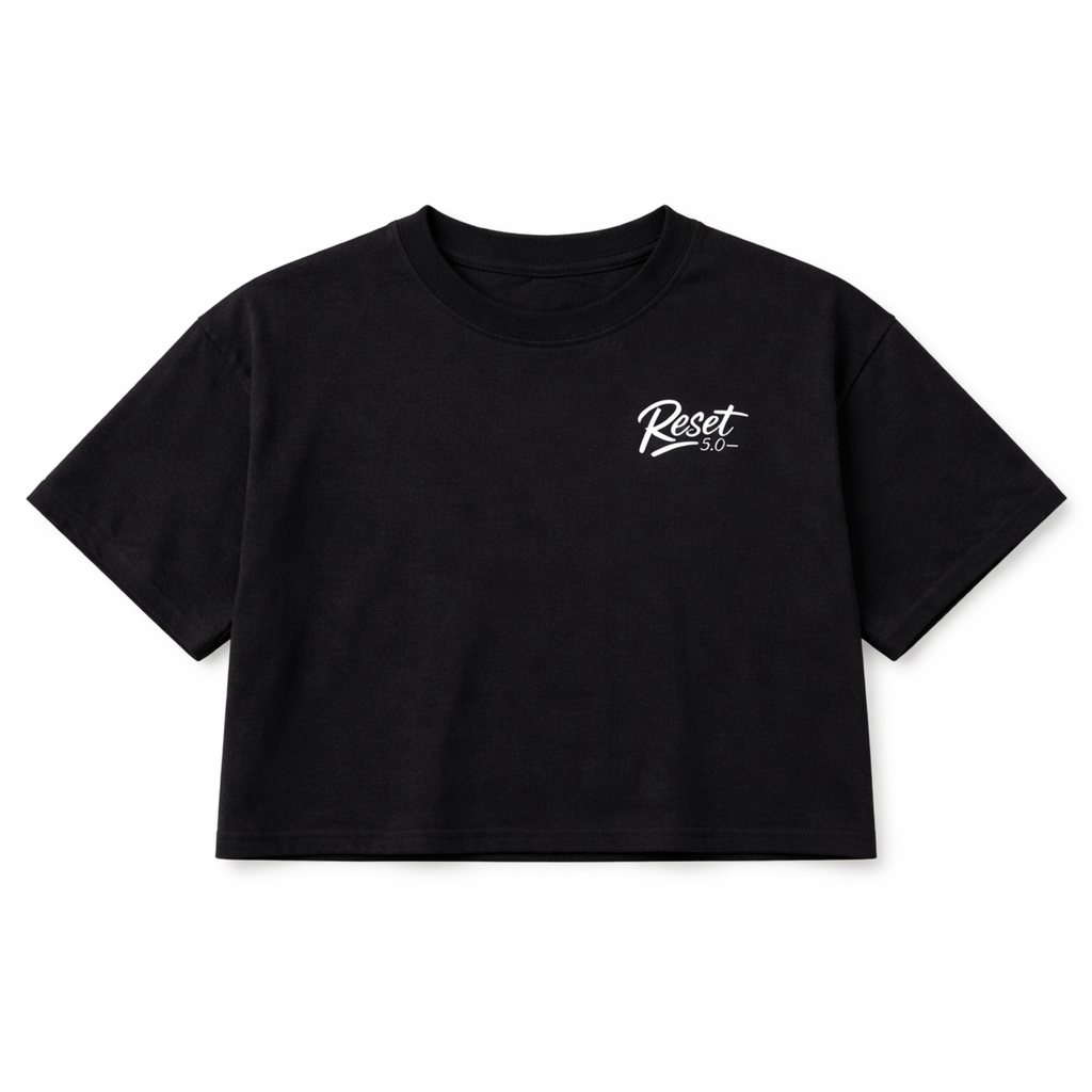 Black crop top with 'Reset' logo on a white background