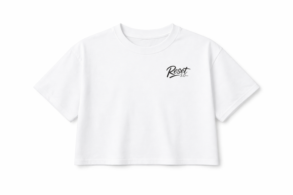 White cropped t-shirt with 'Reset' logo on a white background